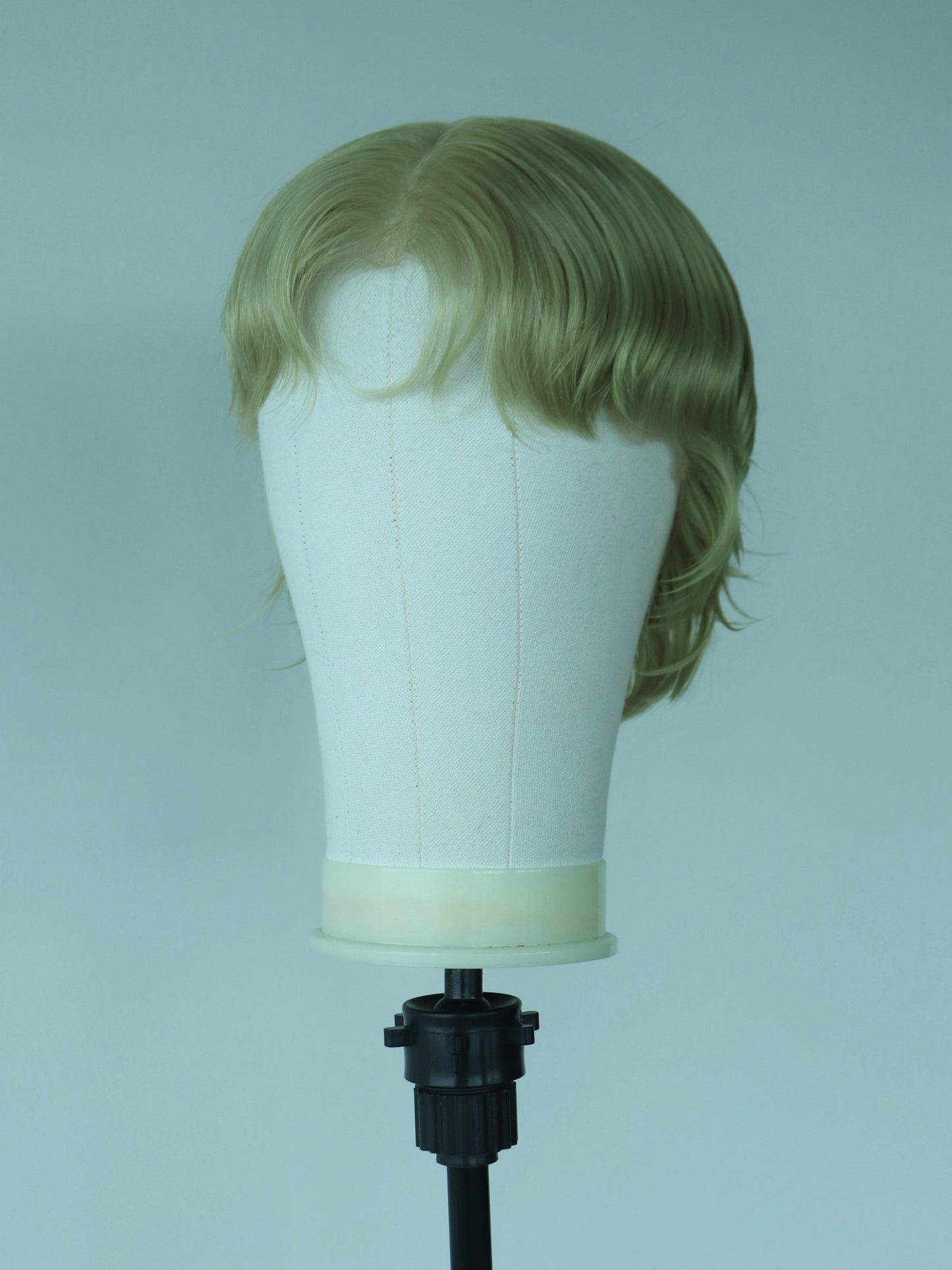 Light green short shaved sides mullet