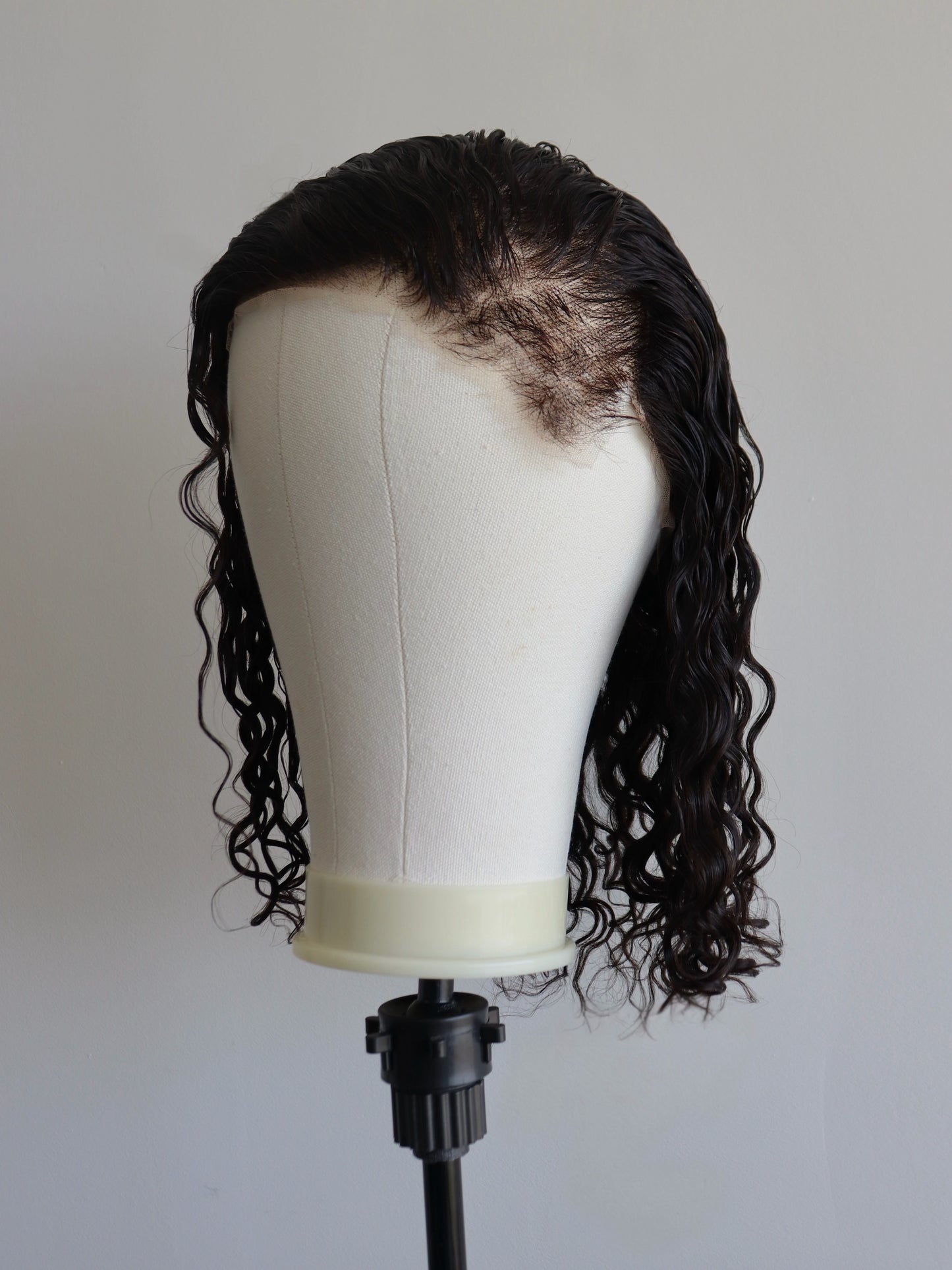 Shaved sides medium length curls