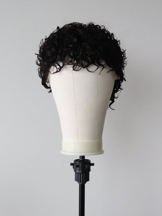 Shaved sides curly mullet