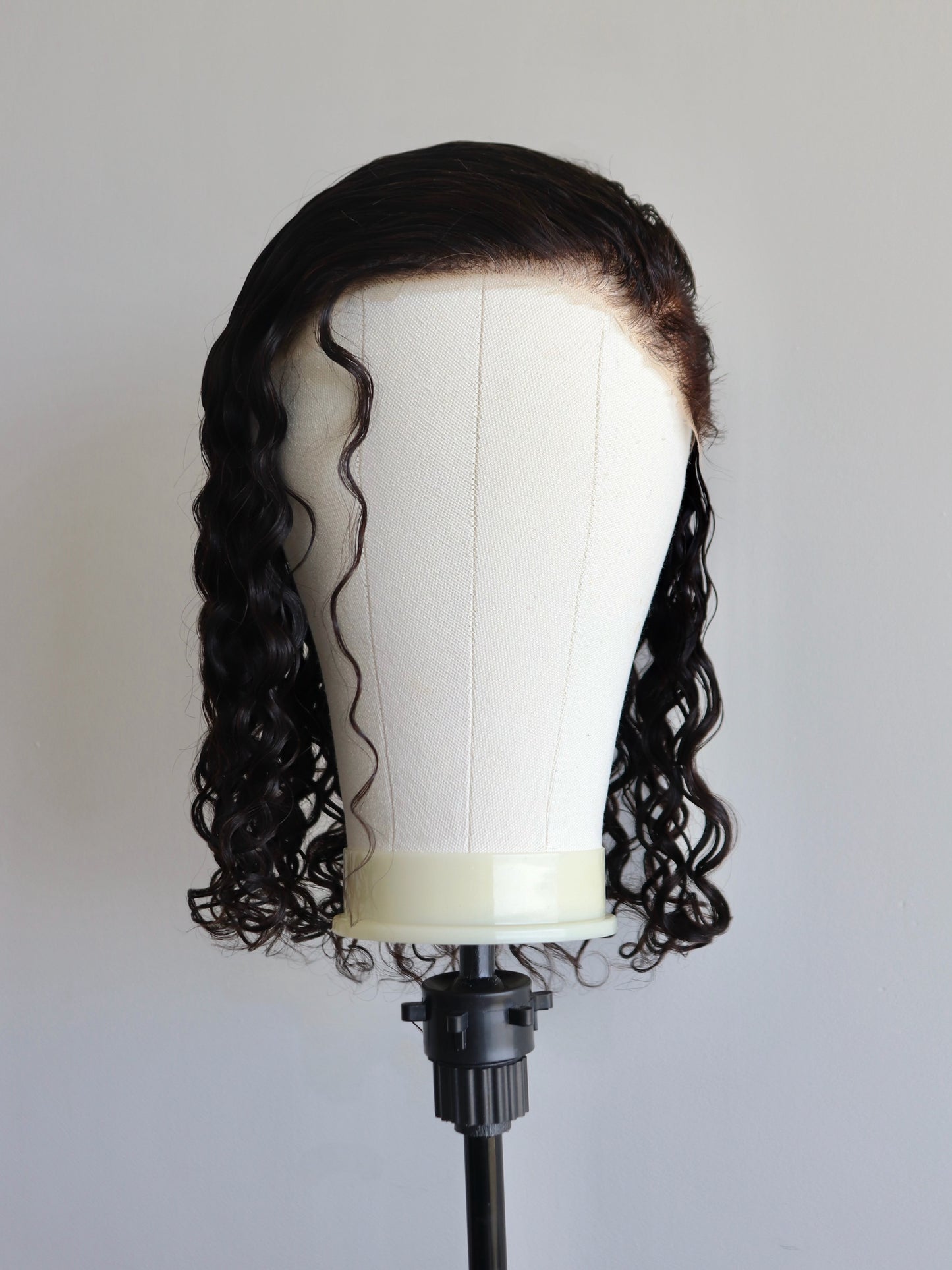 Shaved sides medium length curls