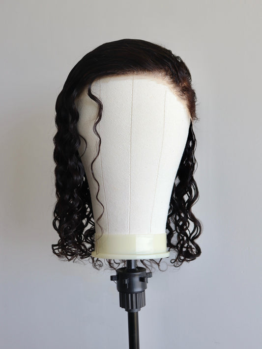 Shaved sides medium length curls