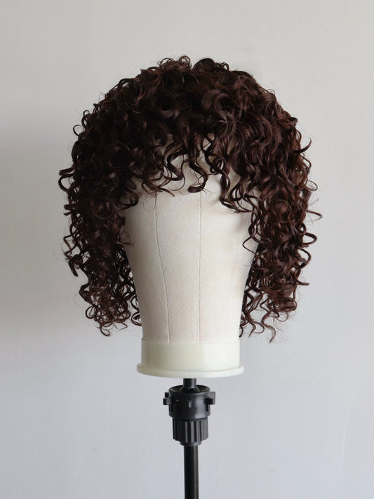 Brown curly shag