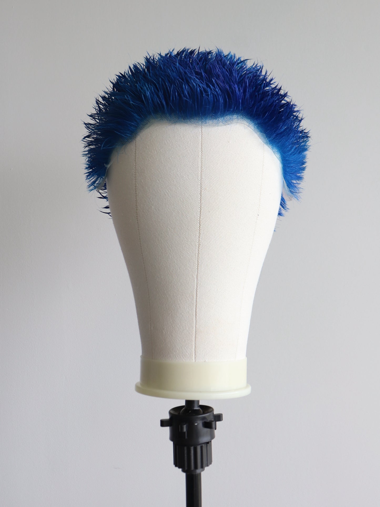 Blue spiky buzzcut