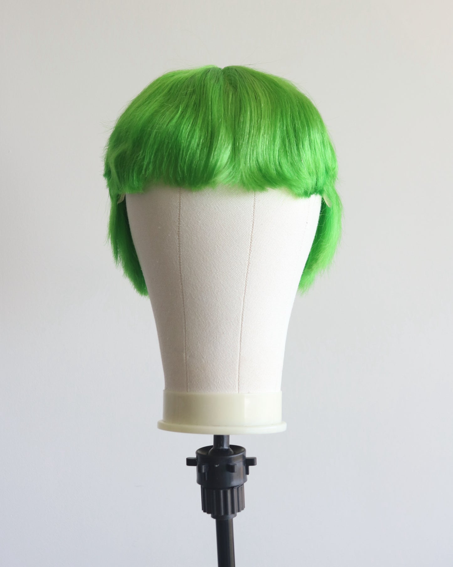 Green short shaved sides mullet