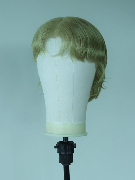 Light green short shaved sides mullet